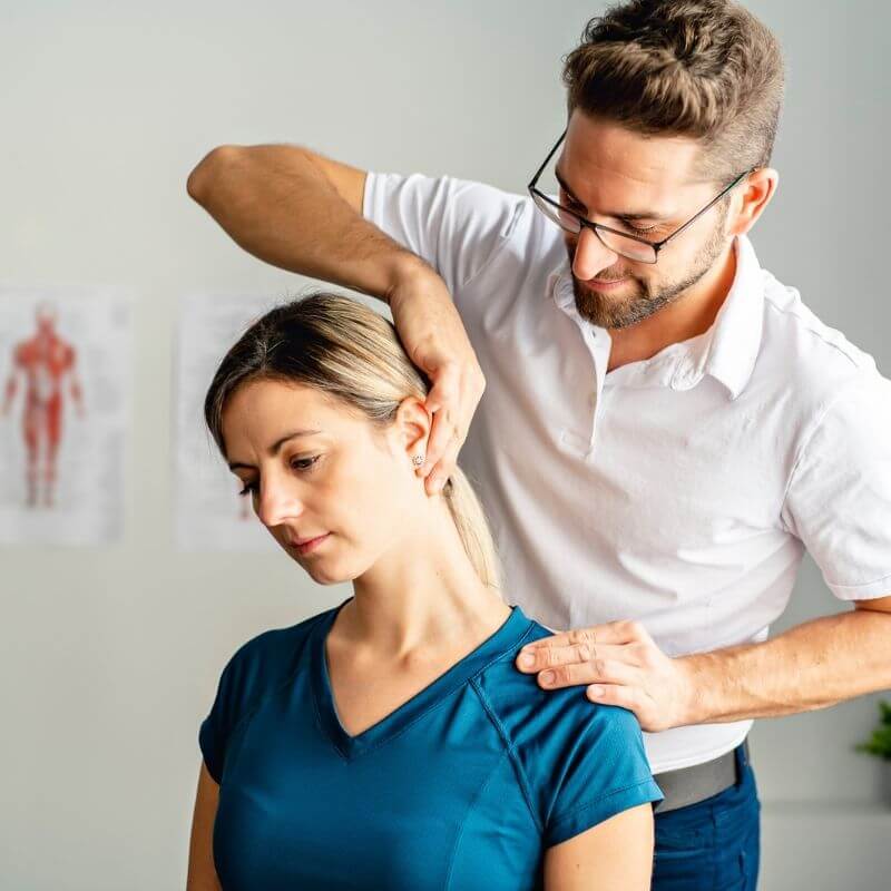 Therapist stretching patient neck square right align